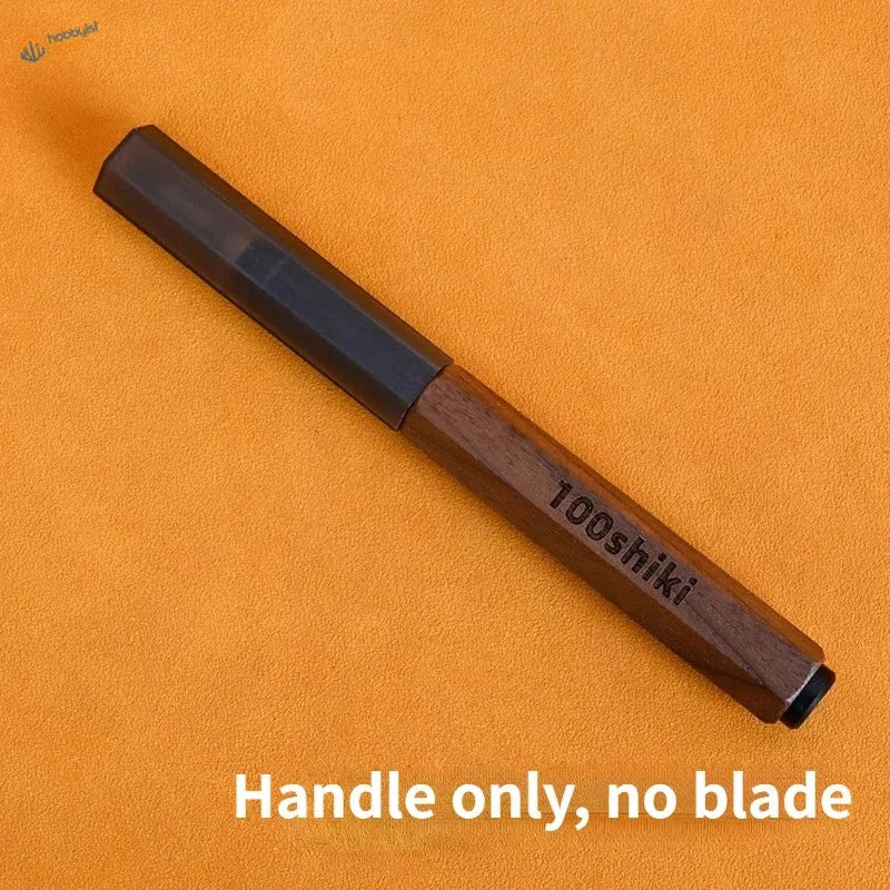 Dark brown wooden handle of 100shiki ceramic engraving knife with black grip