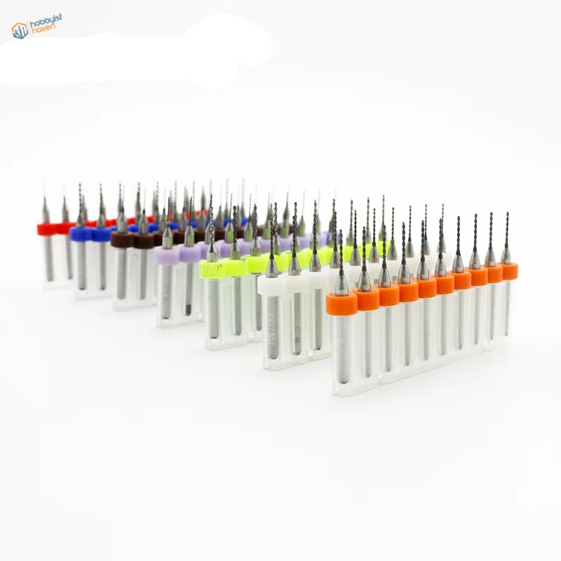 Colorful 0.1-2.0mm carbide micro drill bits in clear plastic holders