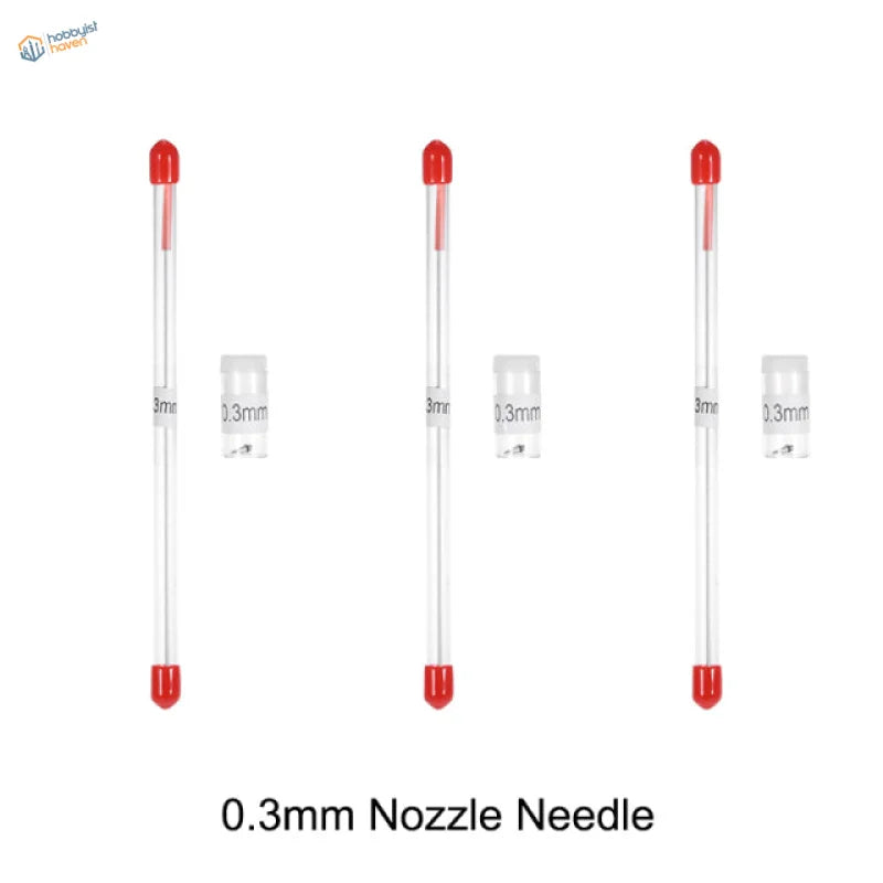 Three 0.3mm airbrush needles with red caps in clear labeled cases, precision hobby tools