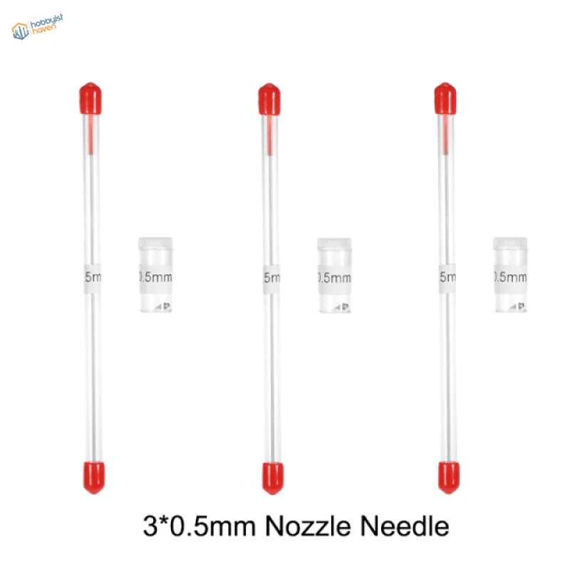 Three 0.5mm transparent airbrush needles with red caps, precision hobby tools