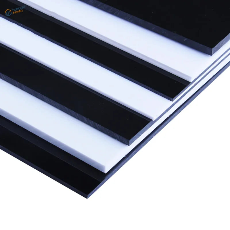 Stacked white styrene sheets, 0.5-3mm thick, 100x200mm and 200x300mm