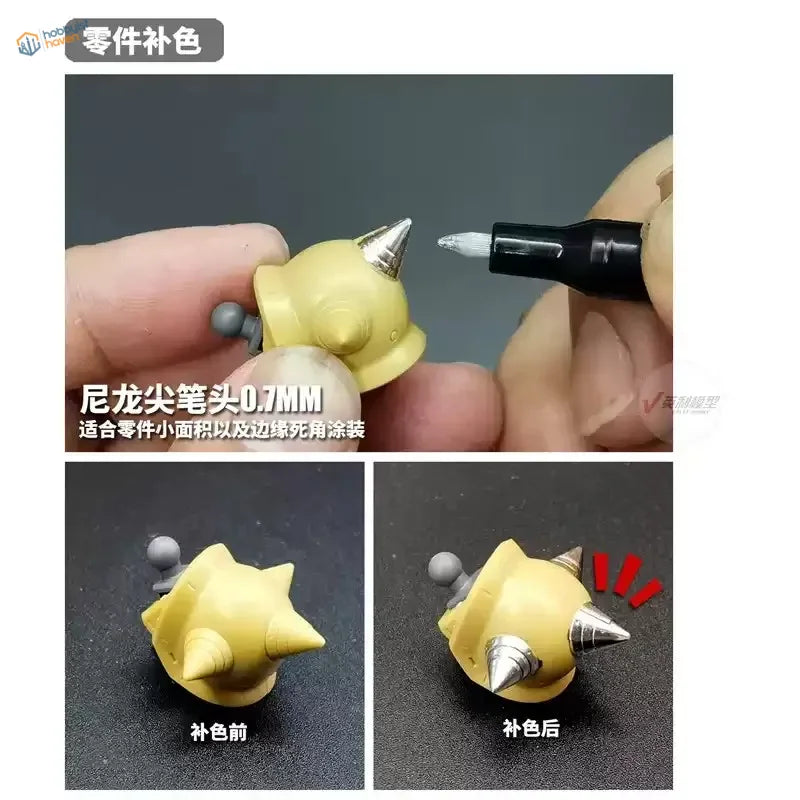 Yellow plastic figurine head painted with metallic marker pens
