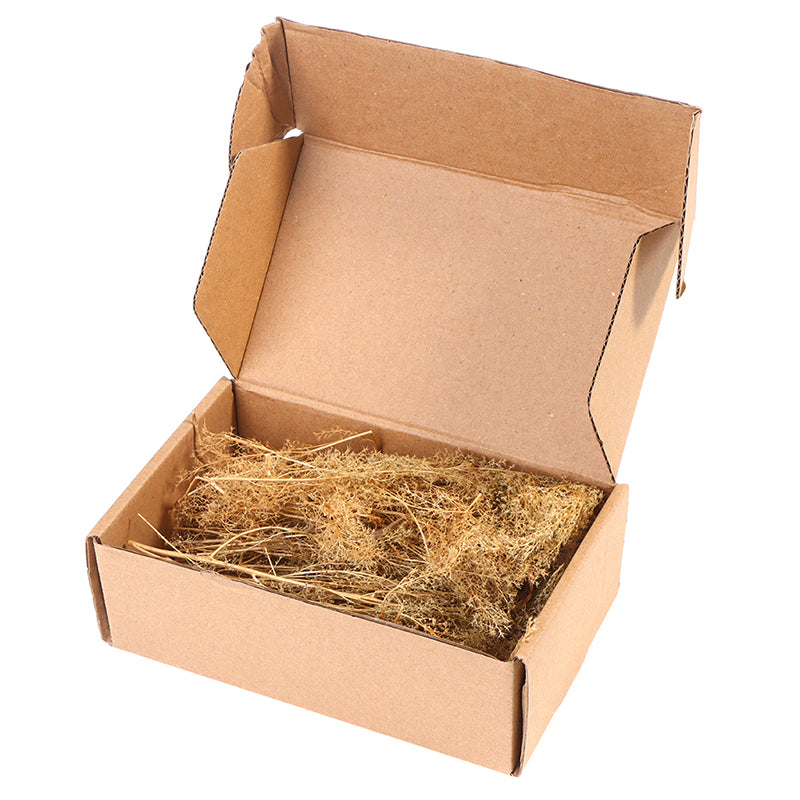 Open brown box of coconut fiber for dry shrubs in diorama creation