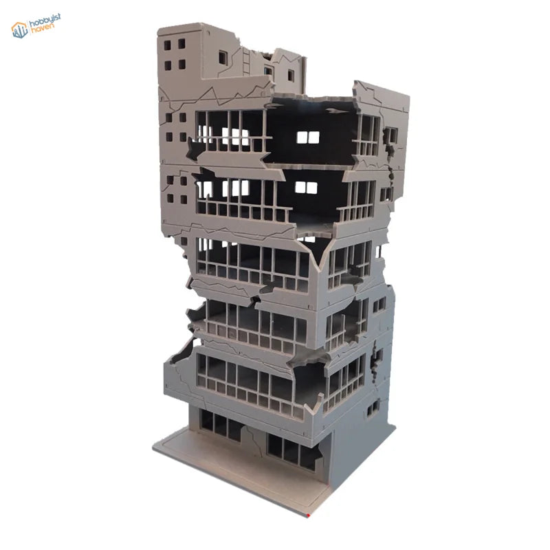 1:100 plastic model of gray damaged building with detailed features