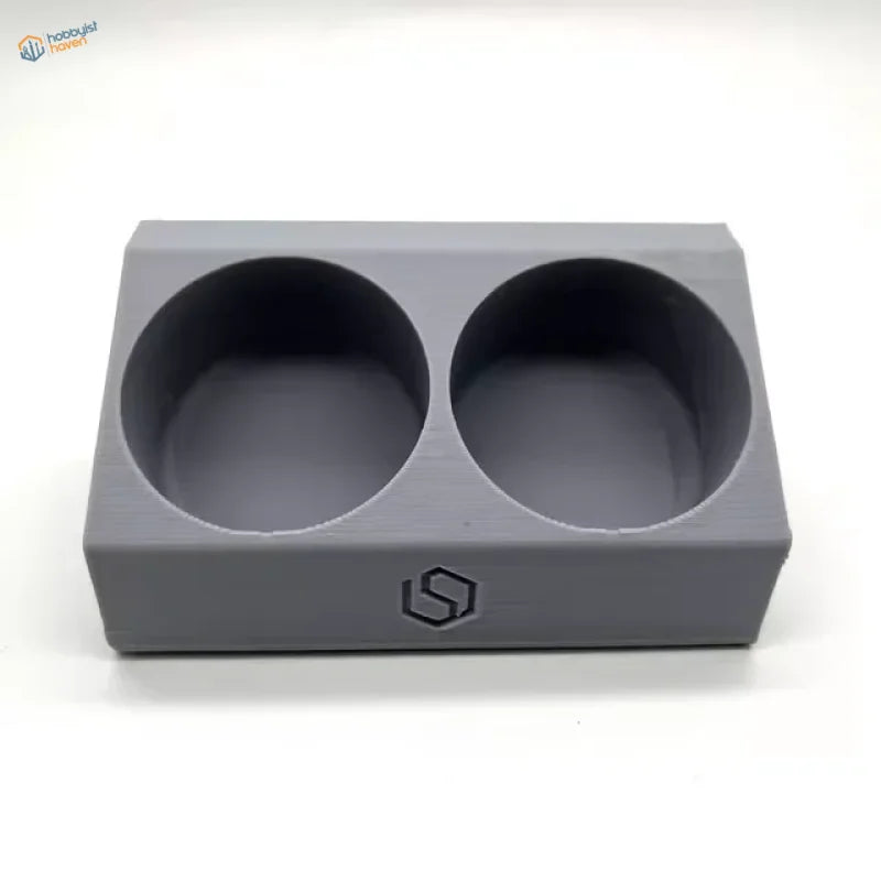 Gray 2-slot glue holder for scale modeling tools with geometric logo