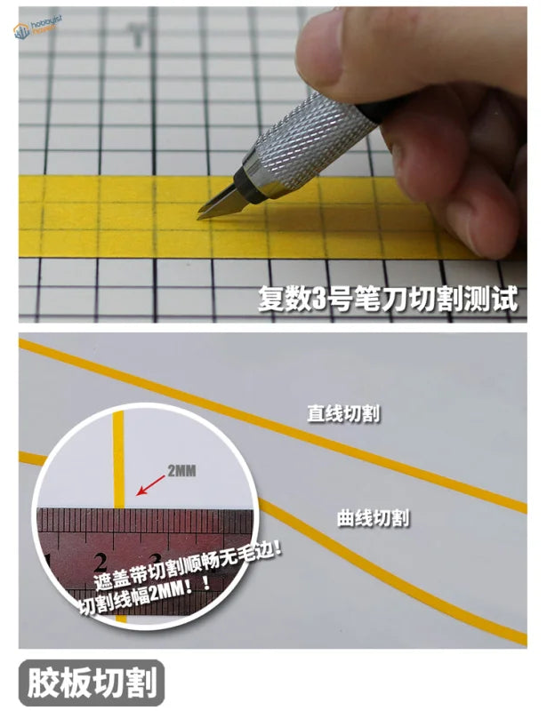Silver-tipped 1-2mm double-edged cutting knife slicing yellow tape on graph paper
