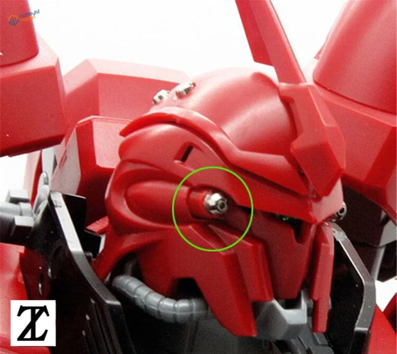 Red Gundam head with cylindrical metal bolt detail for precision hobby tools
