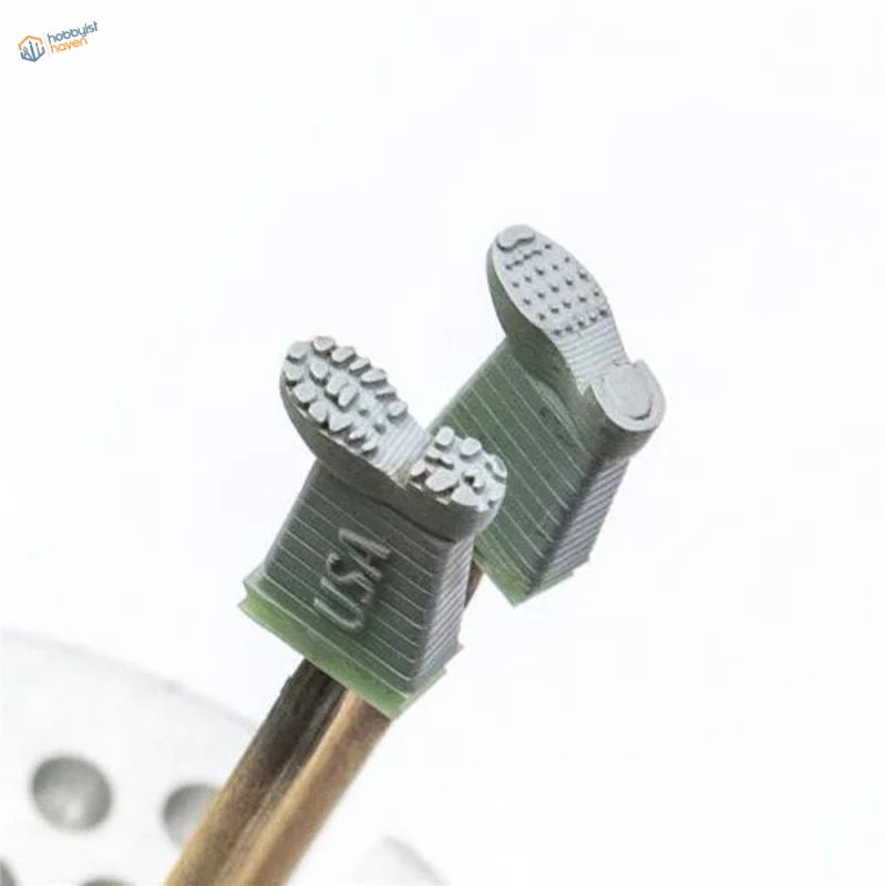 Gray 3D-printed 1/35 shoeprint tools with USA engraved boot charms for WWII armies