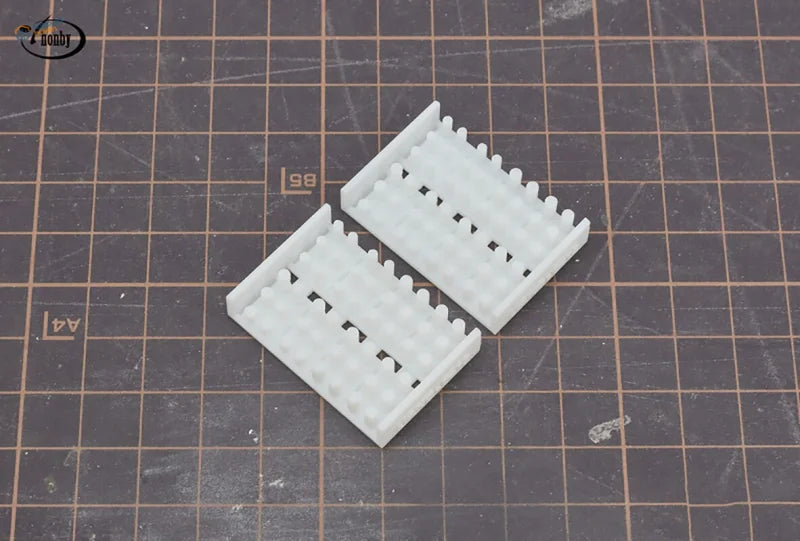 White plastic 3D printed soda cans keycaps with ridged texture
