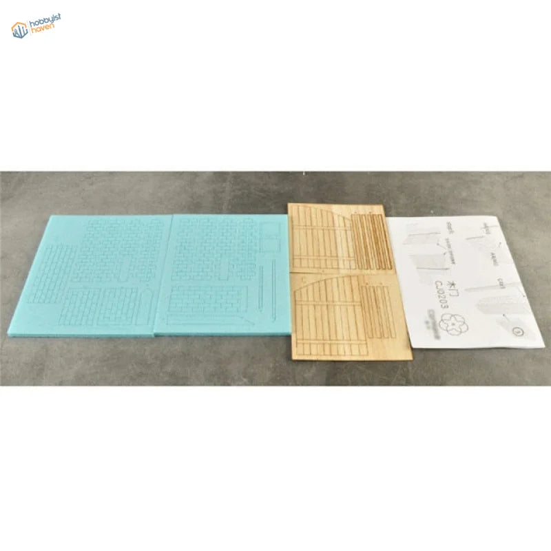 1/35 European wooden door scenario: light blue grid mat, tan template, manual