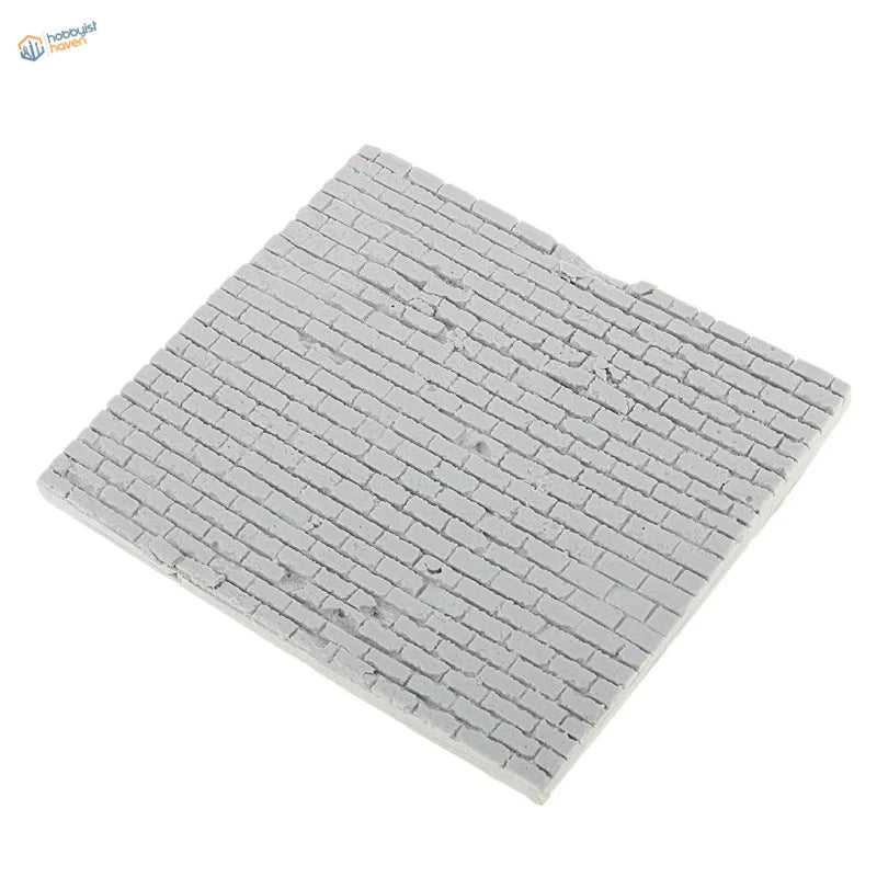 Gray resin brick wall panel in 1/35 scale with brick pattern