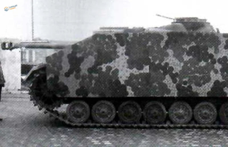 WWII German disc camouflage stencil on armored vehicle with turret