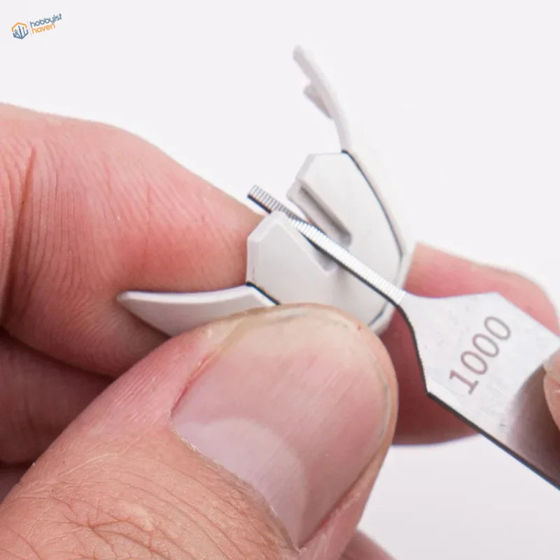White plastic extra fine nail file with 1000 metallic blade for fine grinding
