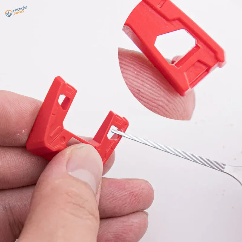 Red plastic SIM tray with tool in slot for 1-3mm extra fine files