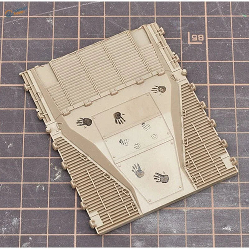 Tan 1/72 scale plastic armored roof panel with printed handprint stamps