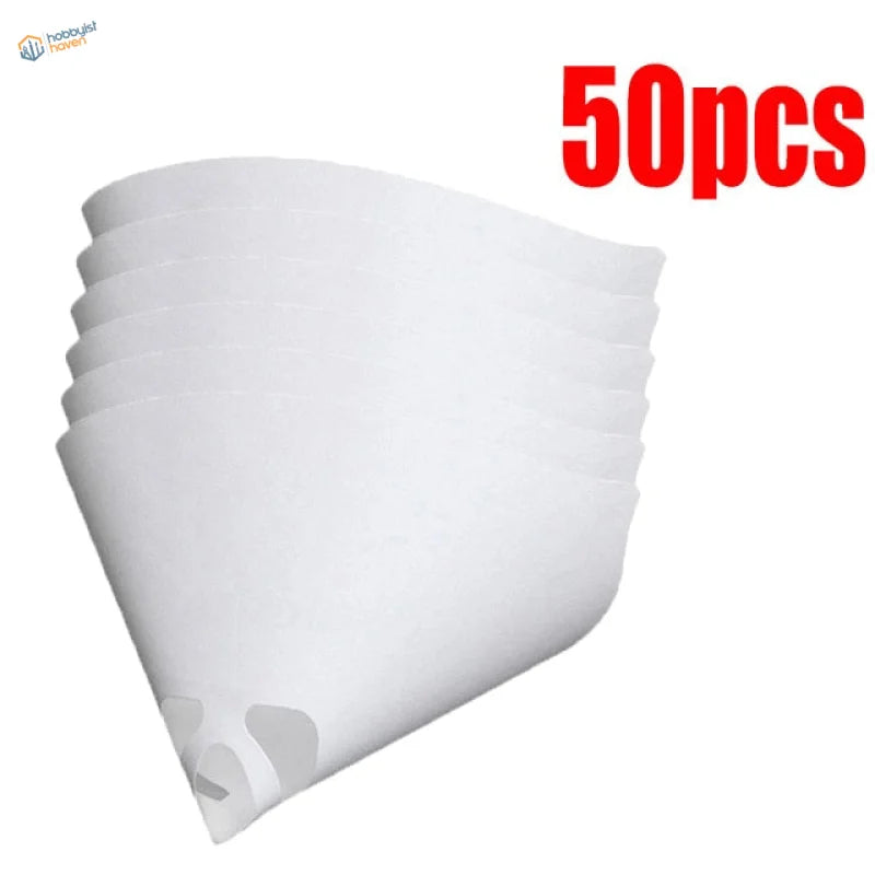 Stack of 50 white translucent paint filters for scale modeling tools