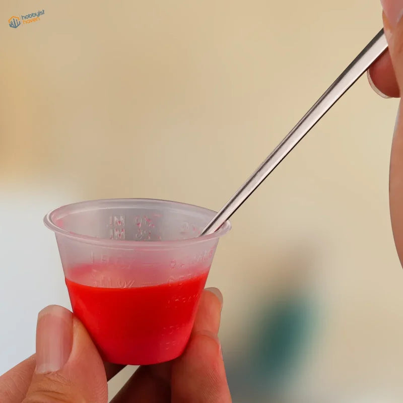 30ml translucent mixing cup with red liquid and spoon, scale modeling tool