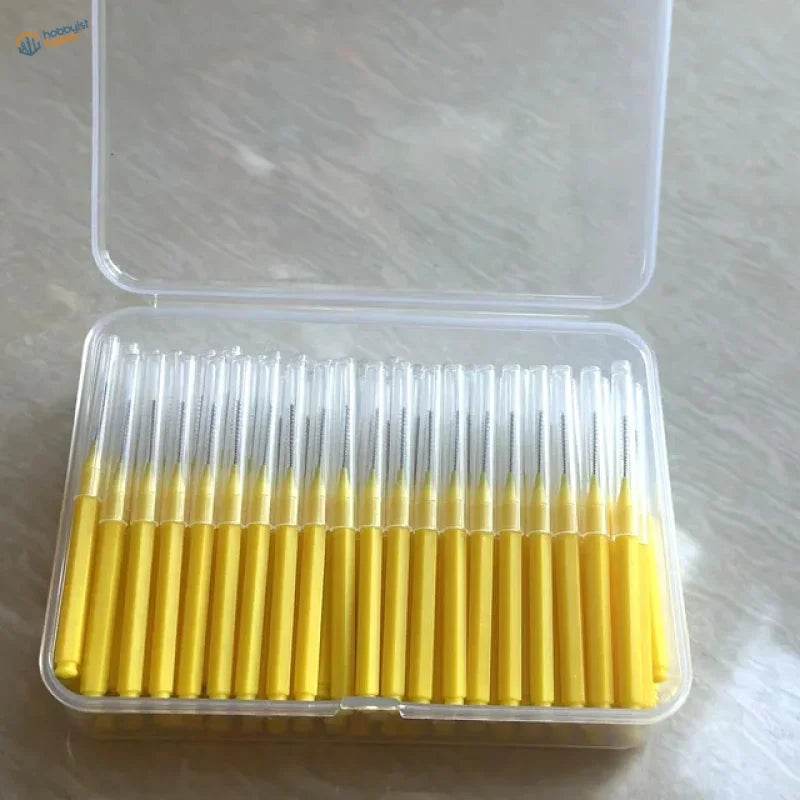 100pcs mini brushes for airbrush cleaning in clear case with 30 yellow-handled interdental brushes