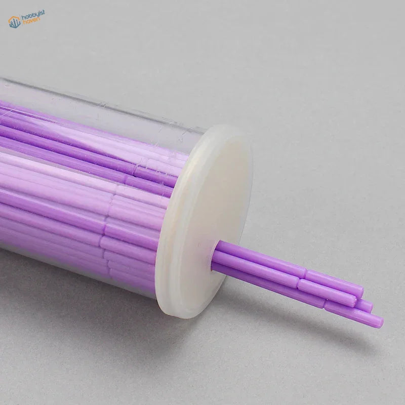 100pcs mini brushes: lavender dental sticks in clear container with white lid