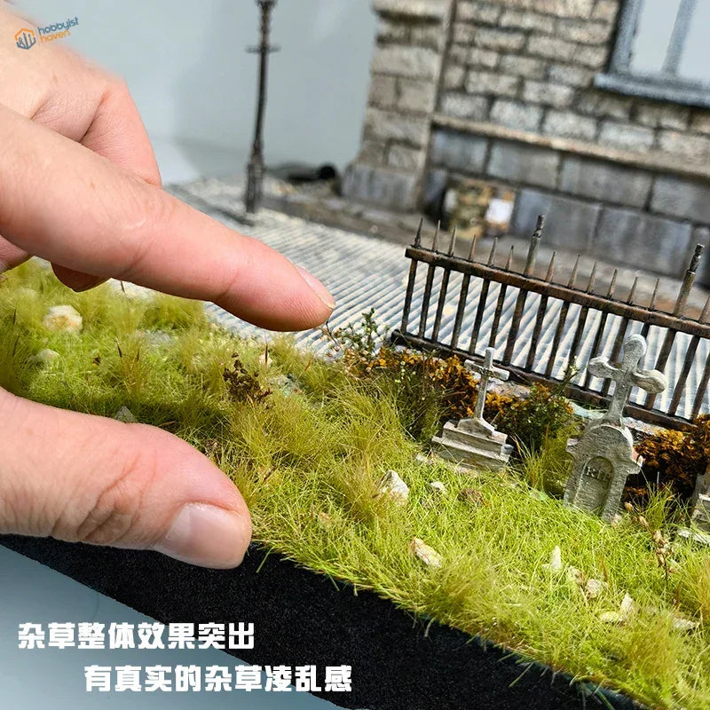 Miniature graveyard diorama with 10-13mm long static grass and mossy tombstones