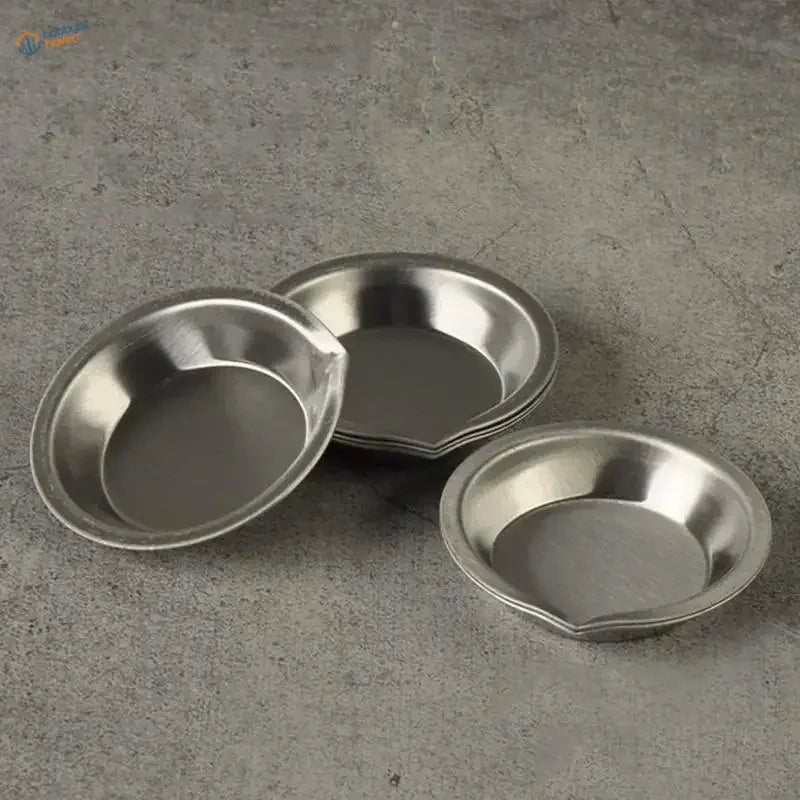 Three shiny 12pcs stainless steel pie pans with raised edges