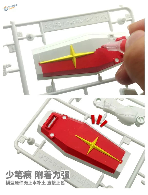 Red and yellow Gundam model part with star design for soft tipped acrylic pens