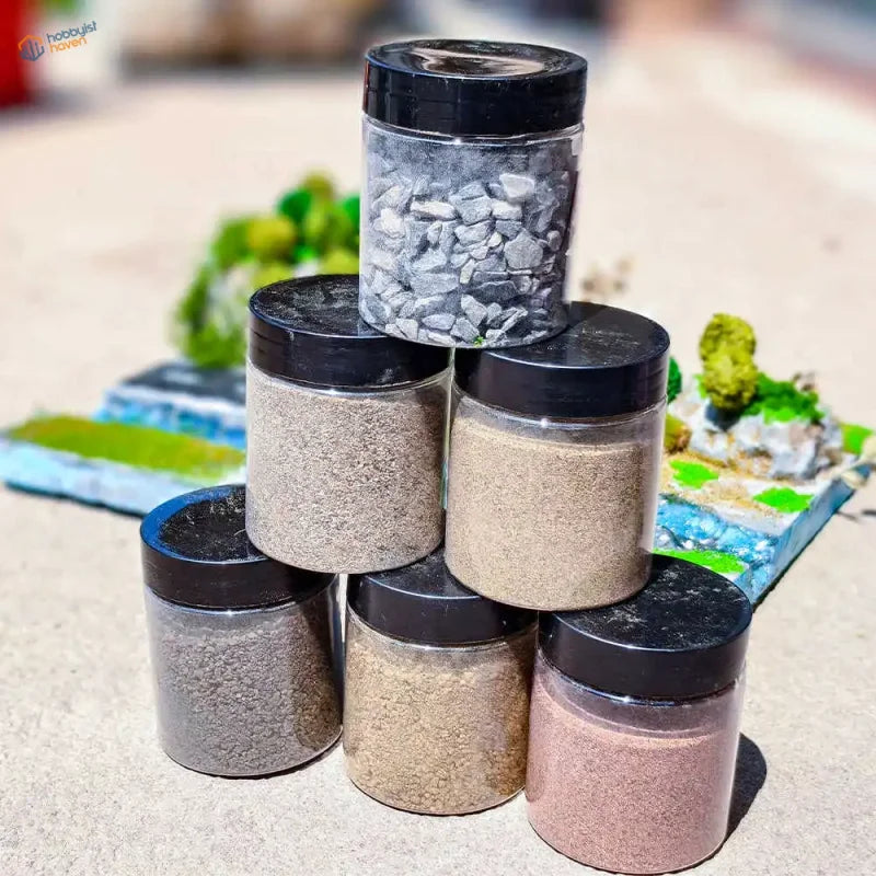 140ml ballast gravel in stacked clear jars with 6 colors