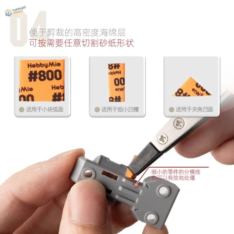 Gray plastic sanding sponge trimmer with metallic blade for model building tools