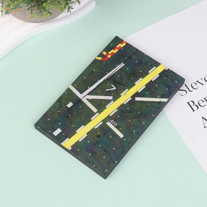 Dark green realistic runway base notebook with 400 runway markings