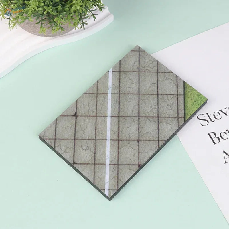 Realistic runway base notebook with gray concrete texture and black edges