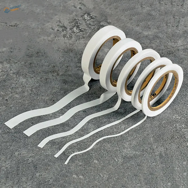 Five rolls of 2-10mm flexible masking tape with gold cores, fanned out