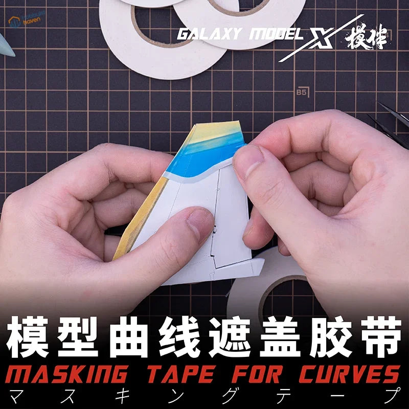 White paper model edge with low tack flexible masking tape in blue and yellow