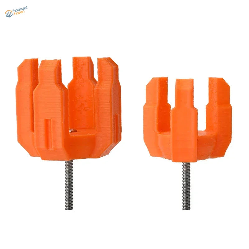 Bright orange arrow rest holders on 2-in-1 paint shaking adapter