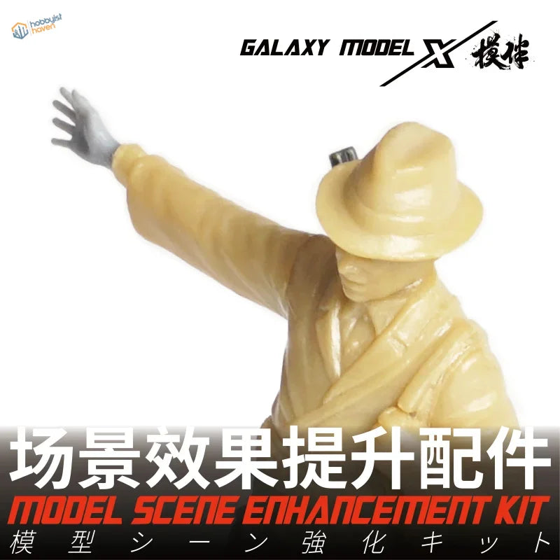 Beige 1/35 scale model man in fedora with extended arm for precision hobby tools
