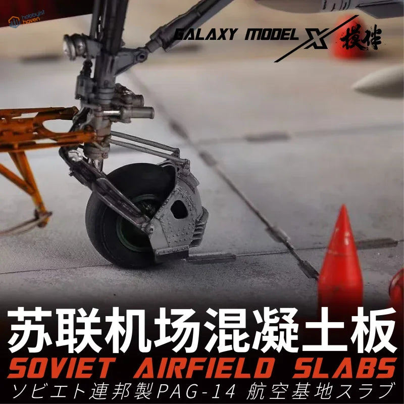 Gray metallic landing gear with tire on 1/48 soviet airfield slabs