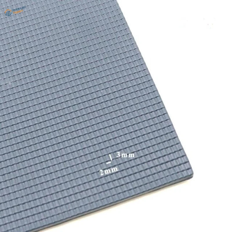 Gray textured PVC roof panels with grid-like yoga mat surface