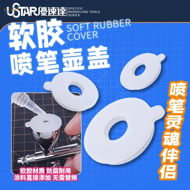 White soft rubber airbrush lid with center hole for paint bottles