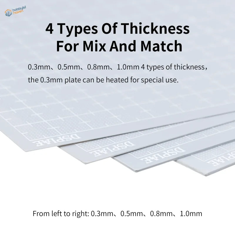 Four graduated plastic boards, 0.3-1mm thick with dspiae grid pattern