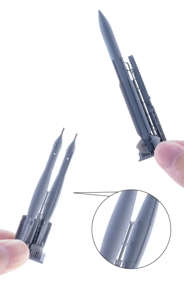 Gray plastic Galaxy Model rocket kit with aircraft weapons, 1/48 scale