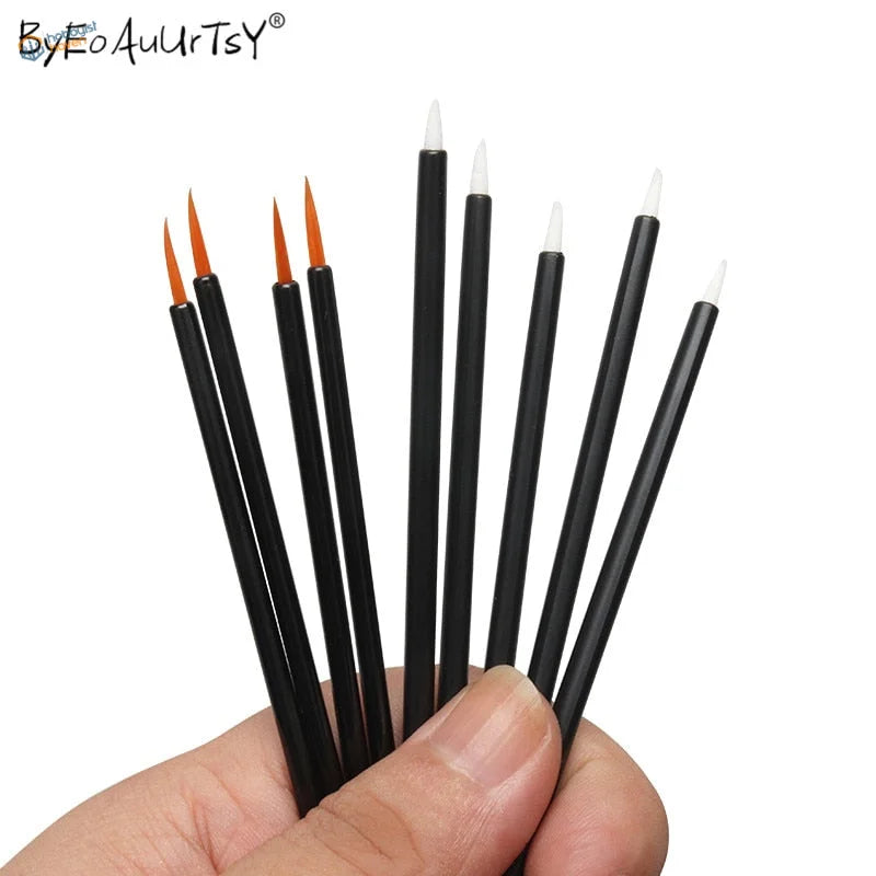 50 pcs disposable round quality brushes with black handles and fine orange tips by Byeoauurtsy