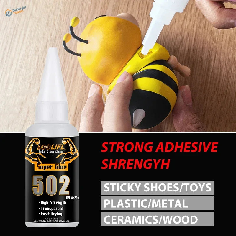 A white bottle of loolif 502 super glue with black label and gold logo for strong bonding in scale modeling tools