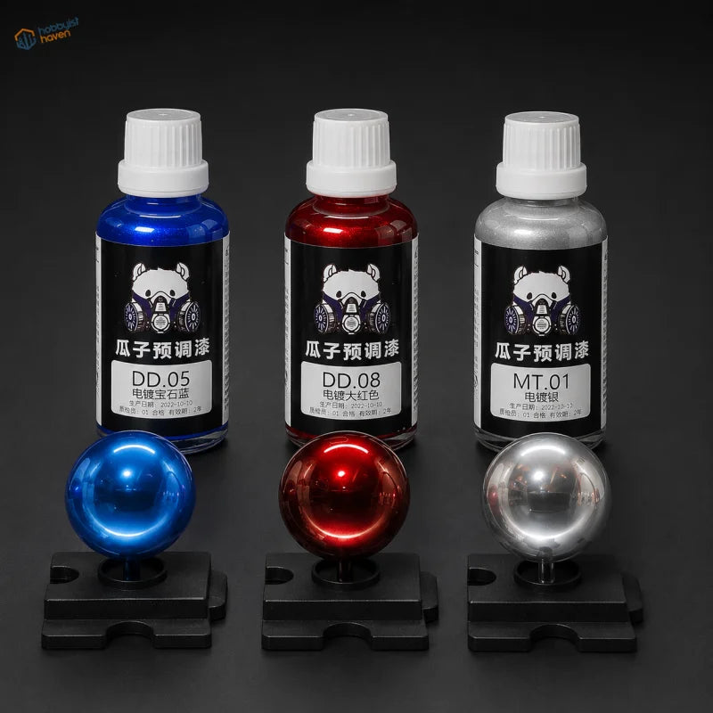 Best-Sellers Trio of three 50ml electroplated mirror-chrome paints in red, blue and silver with sample spheres