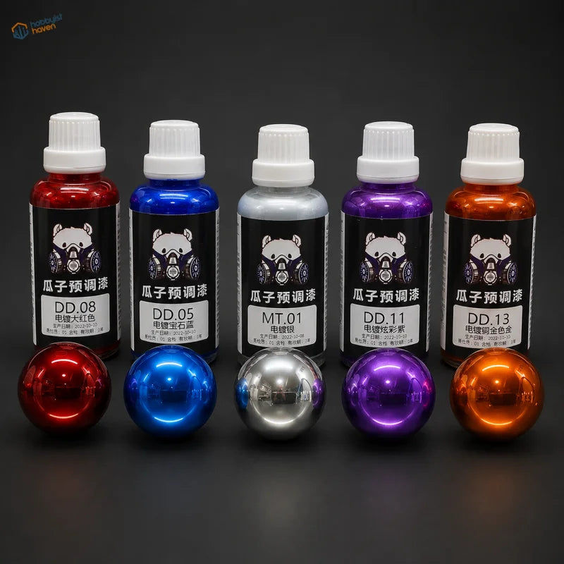 Modeler's Set of five 50ml electroplated mirror-chrome paints in red, blue, silver, purple and copper gold with sample spheres