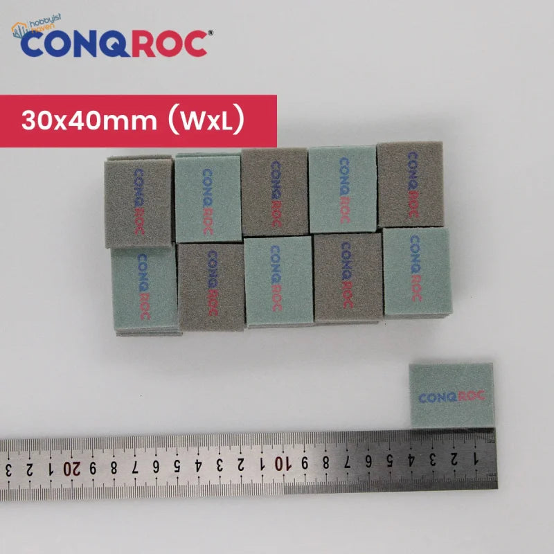 Gray and light blue Conqroc 30x40mm grit sanding sponges for scale modeling
