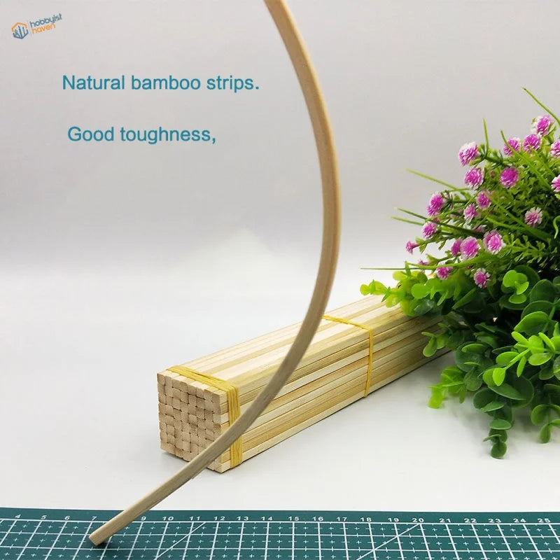 Bundle of 50pcs 30cm round bamboo sticks, light tan, yellow ties for model building