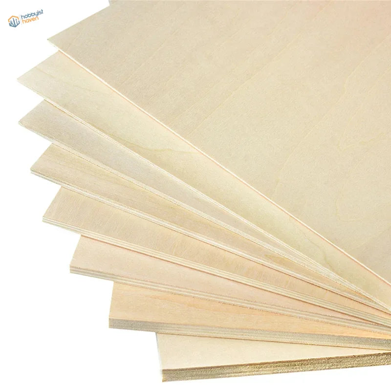Stack of light beige plywood sheets for scale modeling, 1-10mm thick