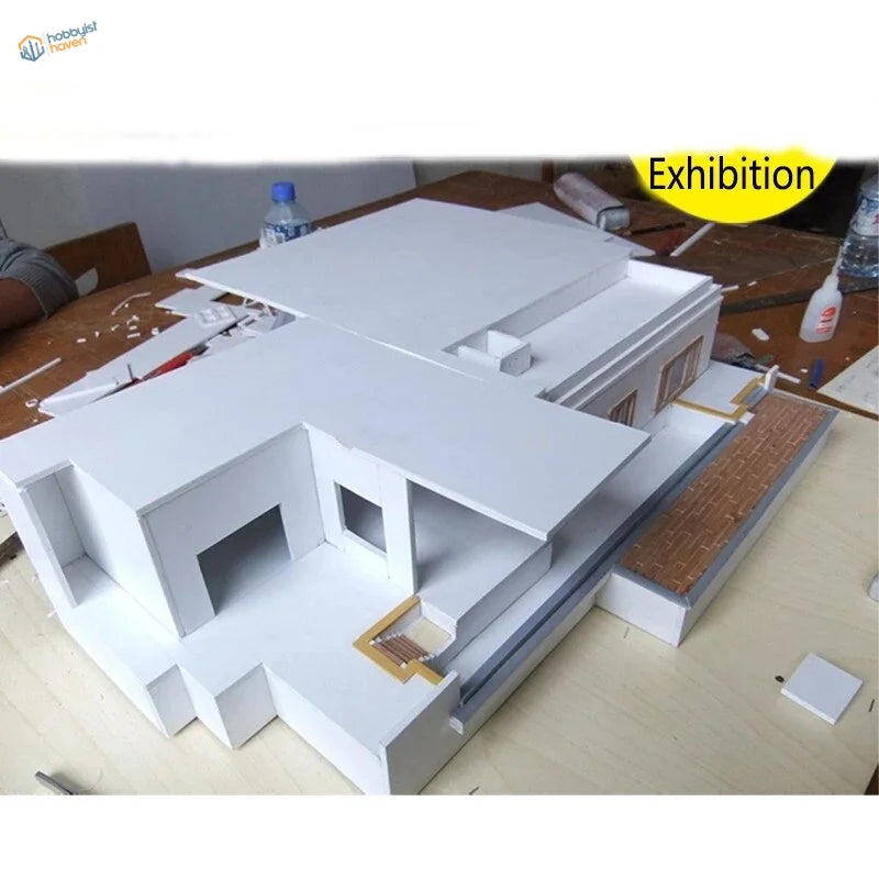 White modern house model with flat roofs from styrene sheets for scale modeling