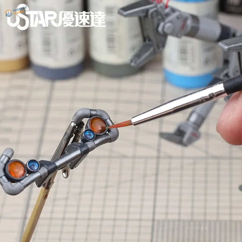 Gray plastic mechanical arm model with orange blue lenses for 7pcs scale modeling brushes