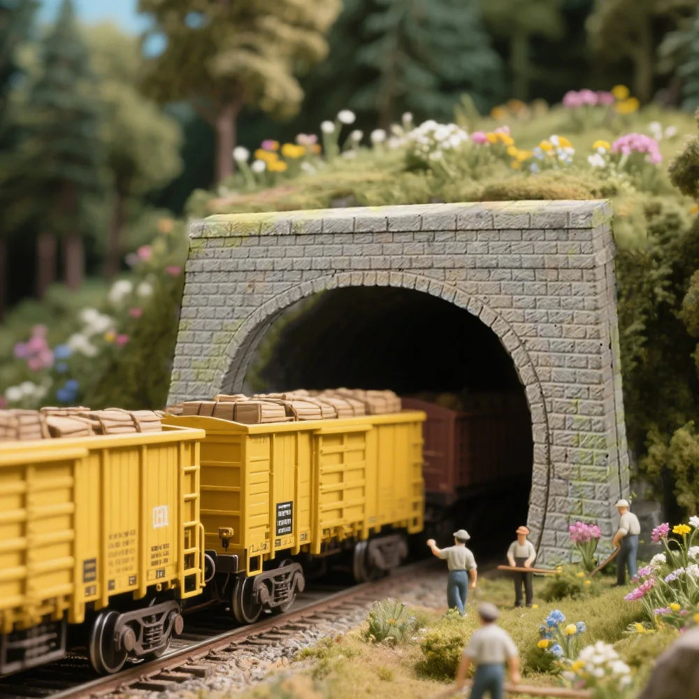 N scale gray stone tunnel portal with mossy arch opening surrounded by greenery for model railway scenery