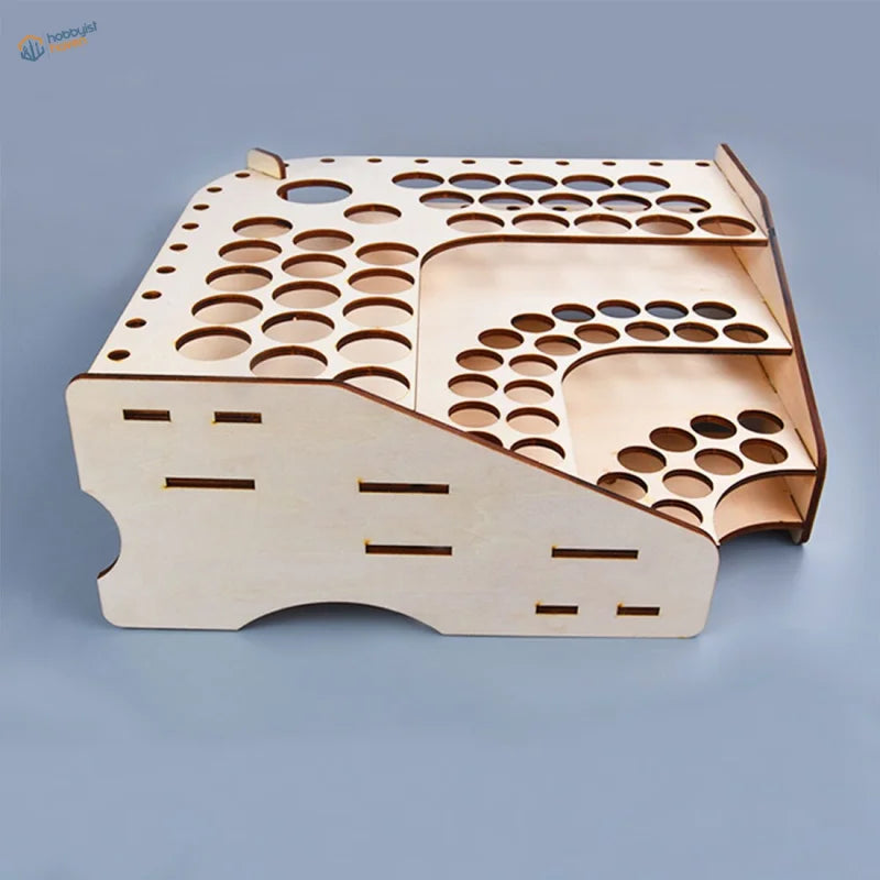 81 holes workbench organizer with light wood circular cutouts for scale modeling tools